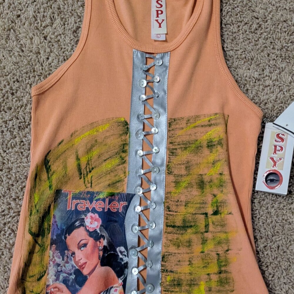 Sexy peach colored Spy t shirt with lace up detail Small Sleeveless graphic
